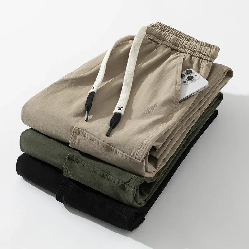 Herren Cargo-Hosen mit weitem Bein, Kordelzugbund und Klapptaschen