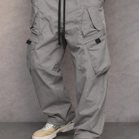 Pantalon cargo pour homme style utilitaire avec taille élastique et poches